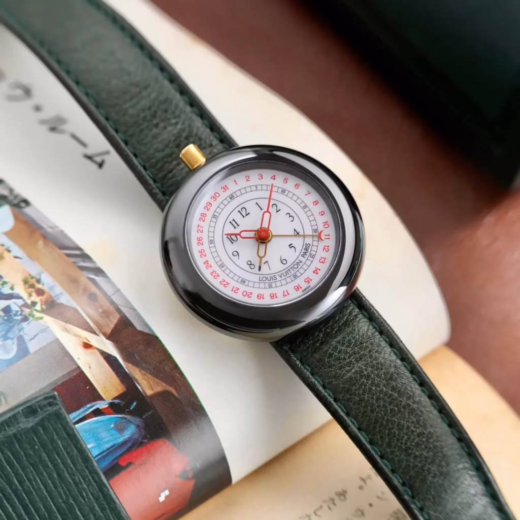 Bring a Loupe: A Polerouter Super, A Movado Bill Time, A Vintage Rolex Sub, And A Louis Vuitton Monterey II