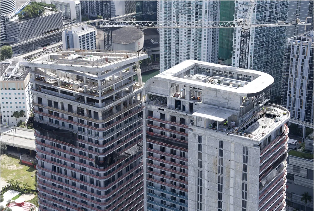 Newgard Group and Two Roads Development Mark Major Construction Milestone at One Brickell Riverfront With Installation of Architectural Crowns
