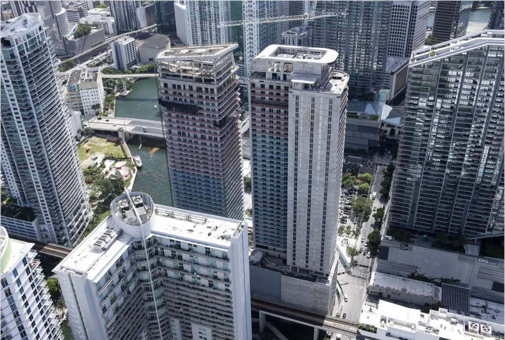 Newgard Group and Two Roads Development Mark Major Construction Milestone at One Brickell Riverfront With Installation of Architectural Crowns