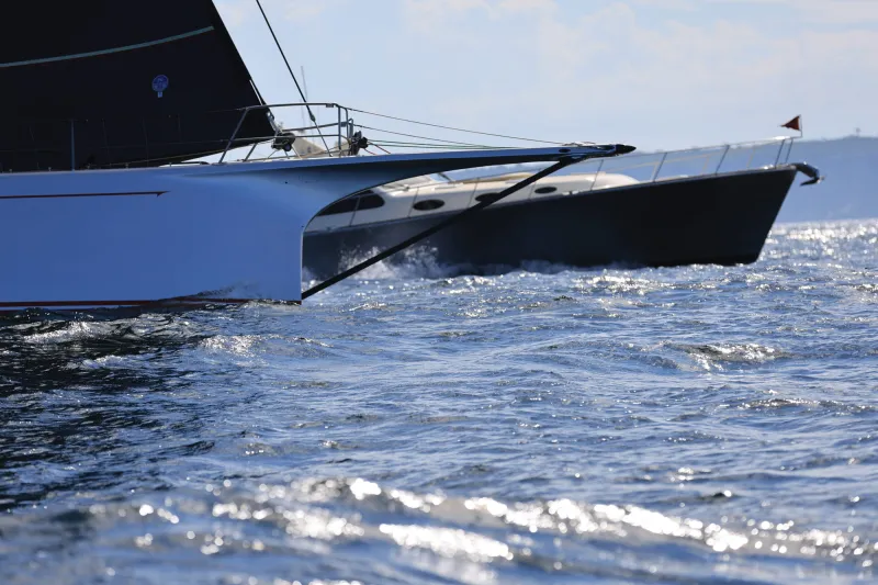A Palm Beach PB 65 Shadows the Sydney Hobart Race Fleet